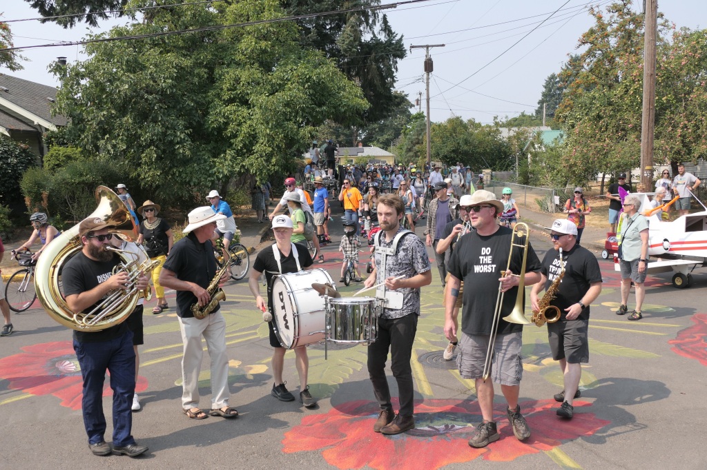 Funk band, DTW, leads the Open Streets parade